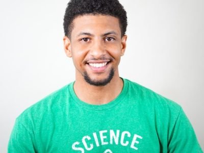 man grinning widely the way happy people do