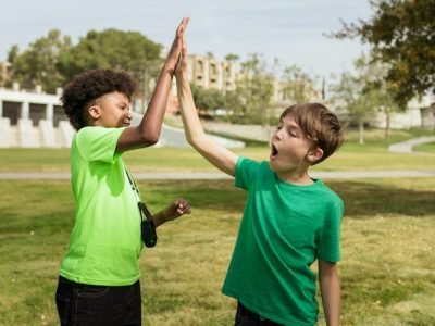 kids trying to socialize outdoors at daytime
