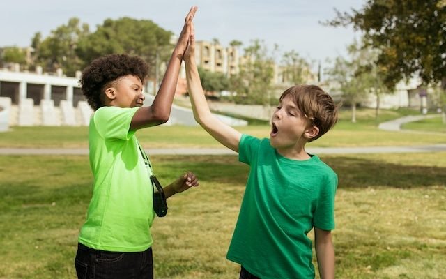 kids trying to socialize outdoors at daytime