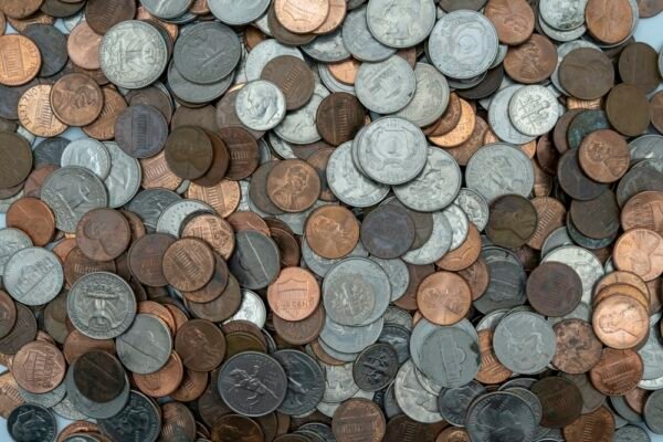 collection of coin money of different sizes and colours