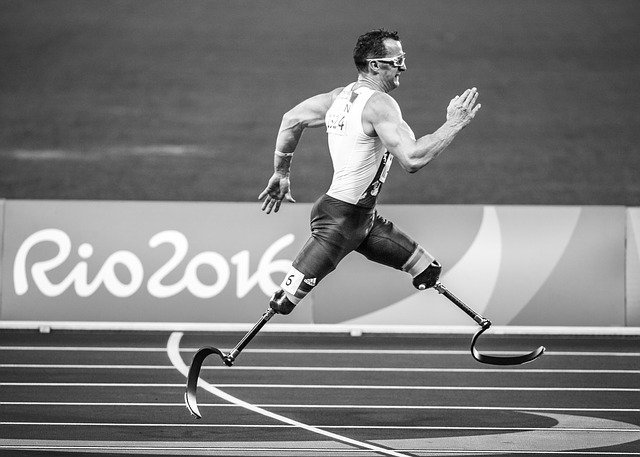 man with disability finishing strong because he is a leader who is relentless