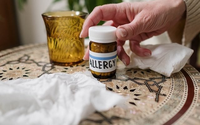 bottle with tablets for allergies
