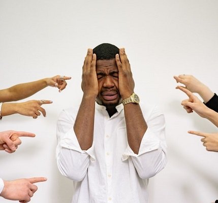man dealing with financial stress