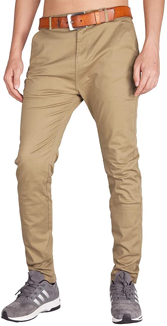 lower body of man wearing tan chinos