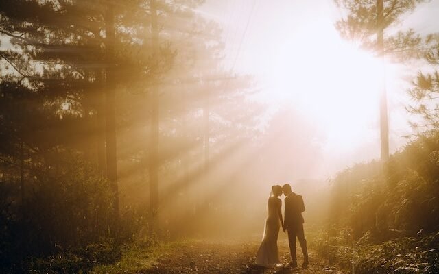 Happily married couple taking a walk in a park