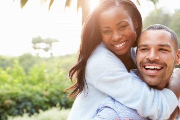 man and woman having fun in their marriage
