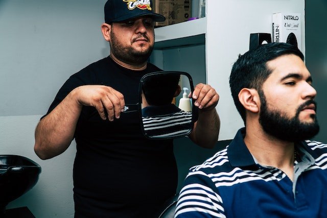 man getting a hair cut
