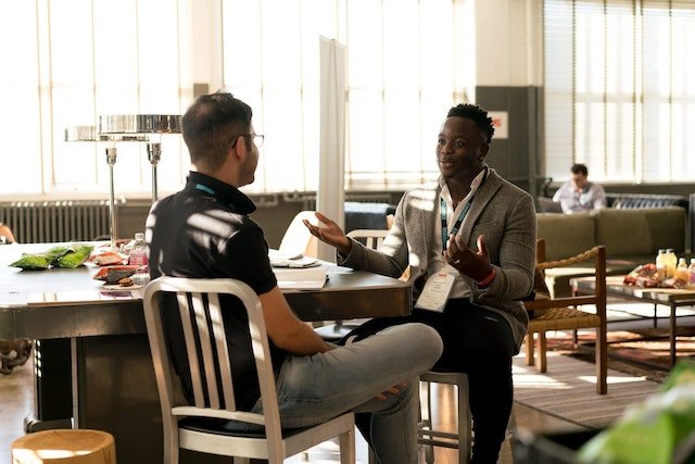 two men engaging in communication