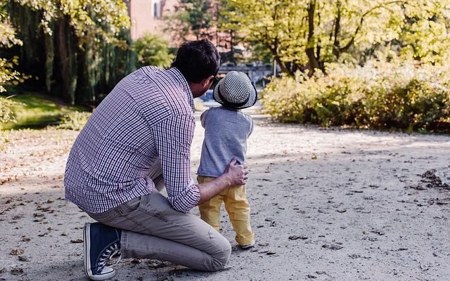dad playing with kid while mom is away