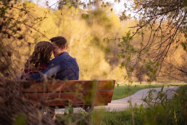Couple in a happy marriage Sitting on Bench